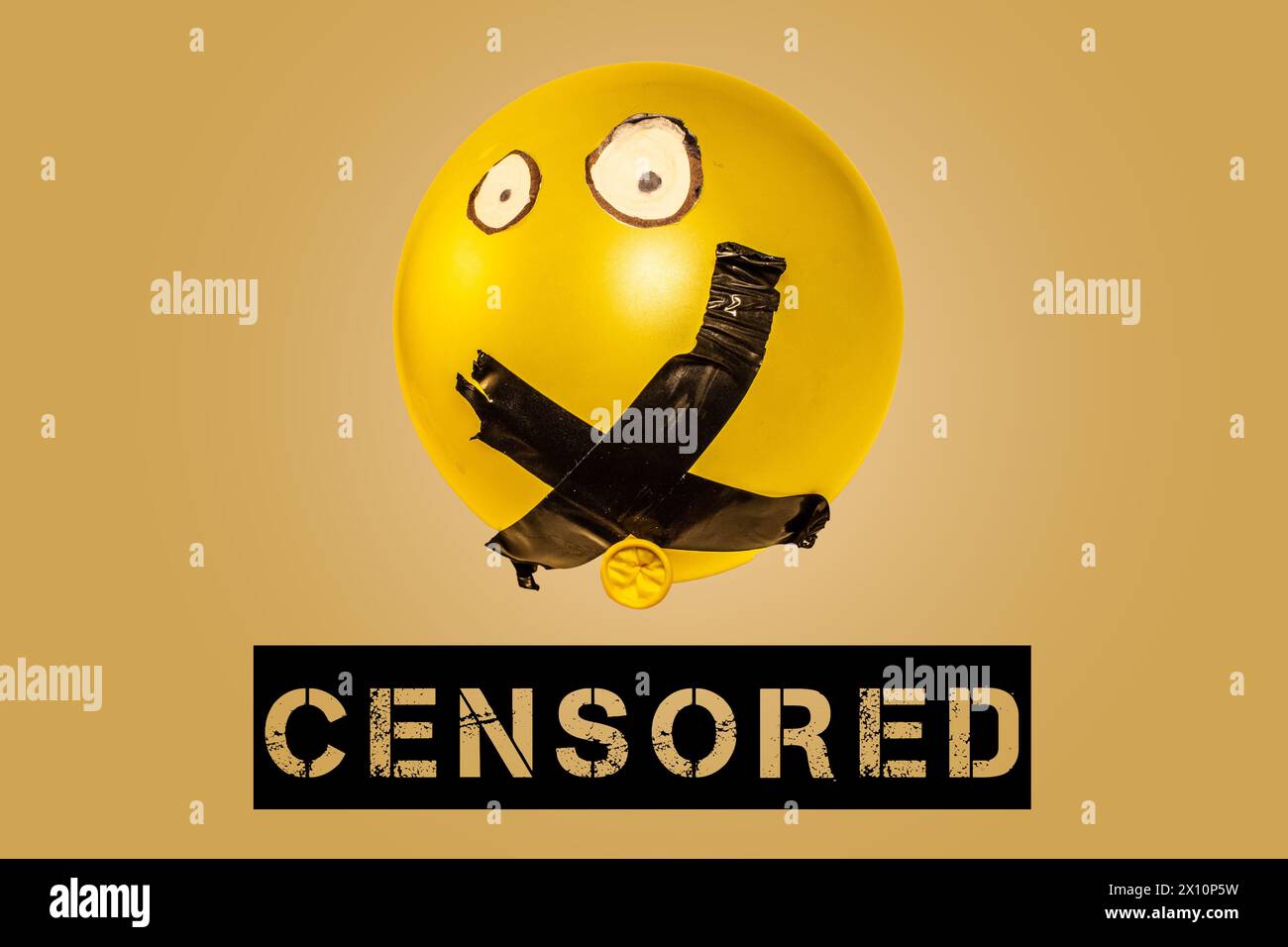 Illuminez les effets étouffants de la censure et annulez la culture avec cette image conceptuelle évocatrice représentant un ballon avec sa bouche fermée Banque D'Images