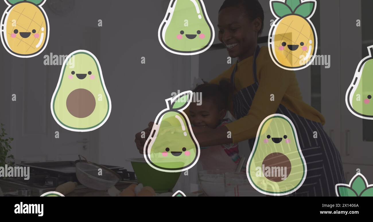 Plusieurs icônes de fruits contre la mère afro-américaine et la fille cuisiner ensemble dans la cuisine Banque D'Images