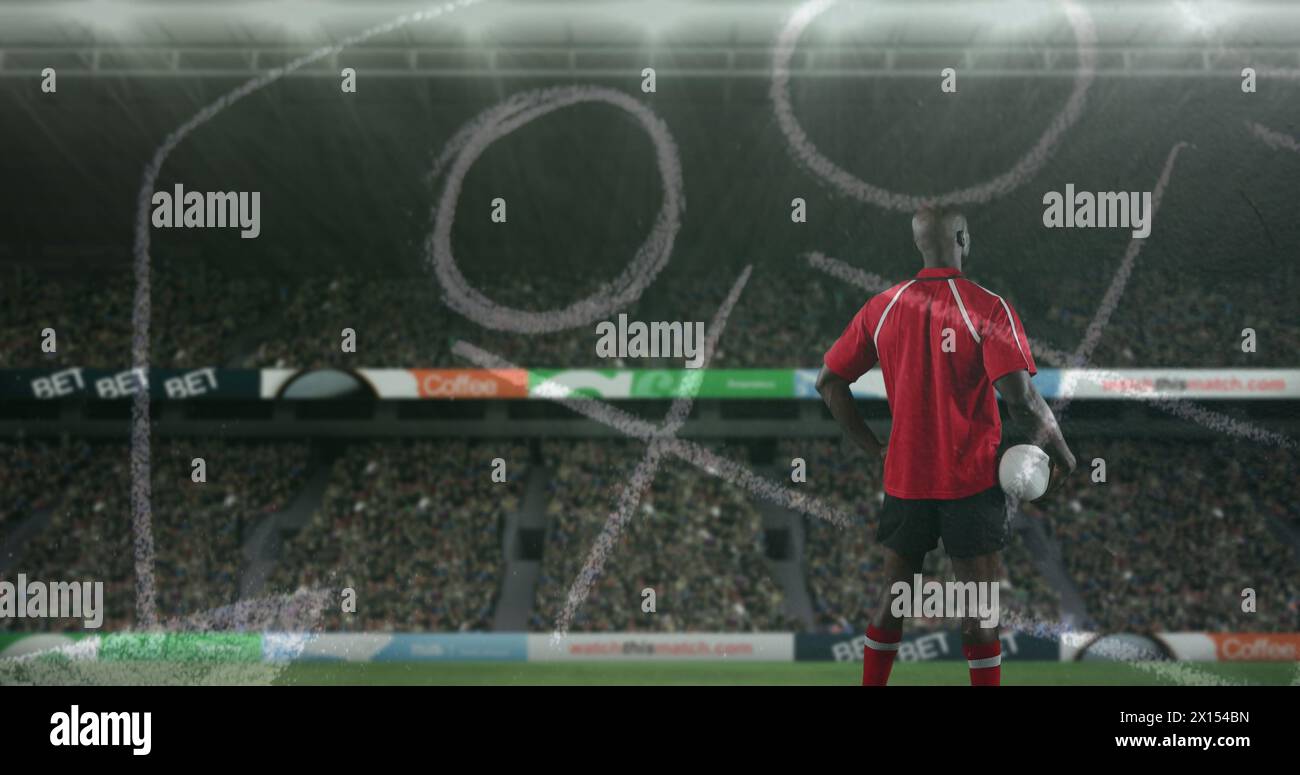 Image du plan de position sur l'homme afro-américain avec le ballon de rugby au stade. Sport, compétition et stratégie concept image générée numériquement. Banque D'Images