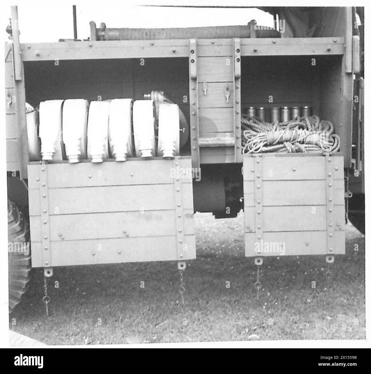 Des photographies de l'école militaire de lutte contre les incendies montrent des engins de pompiers, des appels d'offres et du matériel utilisés pour la formation du personnel. Banque D'Images