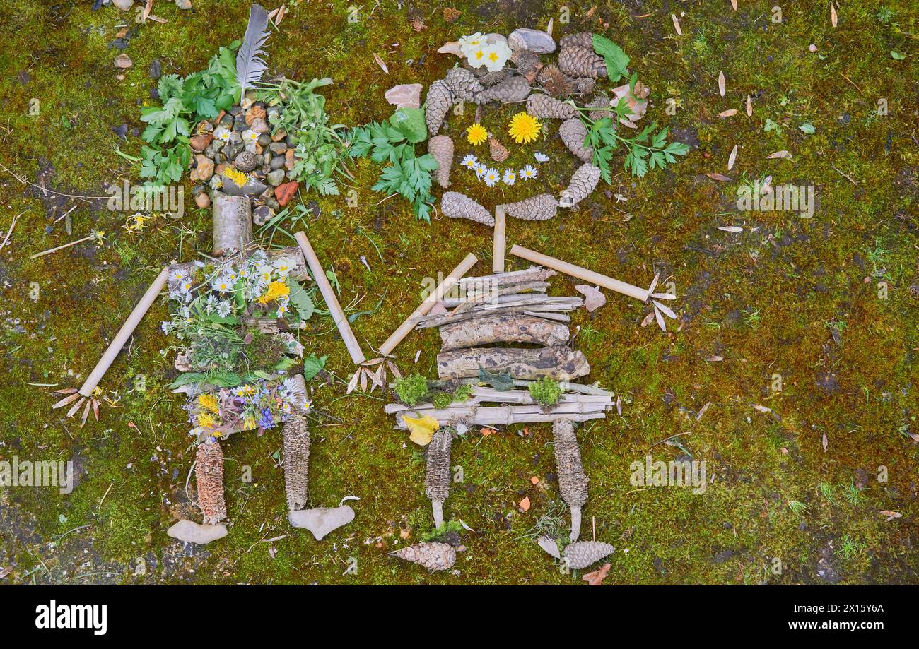 Collage ludique de deux enfants réalisé à partir d'objets collectés dans la nature Banque D'Images