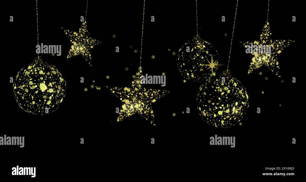 Image de points sur des étoiles dorées et des boules sur fond noir Banque D'Images
