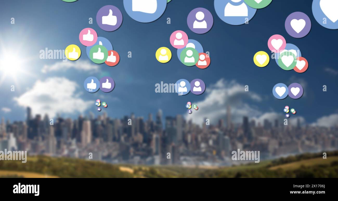 Image de plusieurs icônes colorées des médias sociaux numériques survolant un paysage urbain Banque D'Images