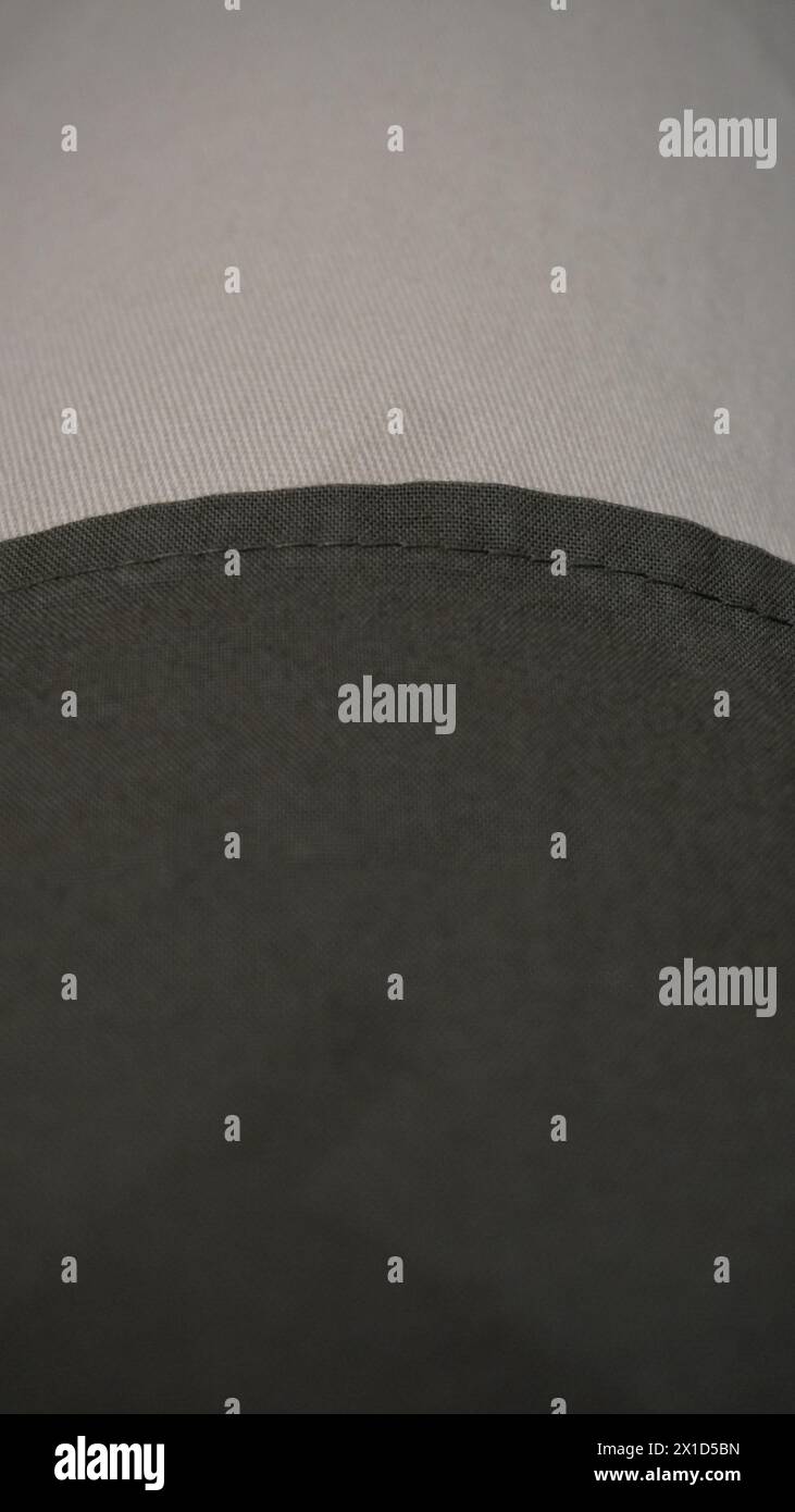 Un fond de couleur vert armée et blanc crème Banque D'Images