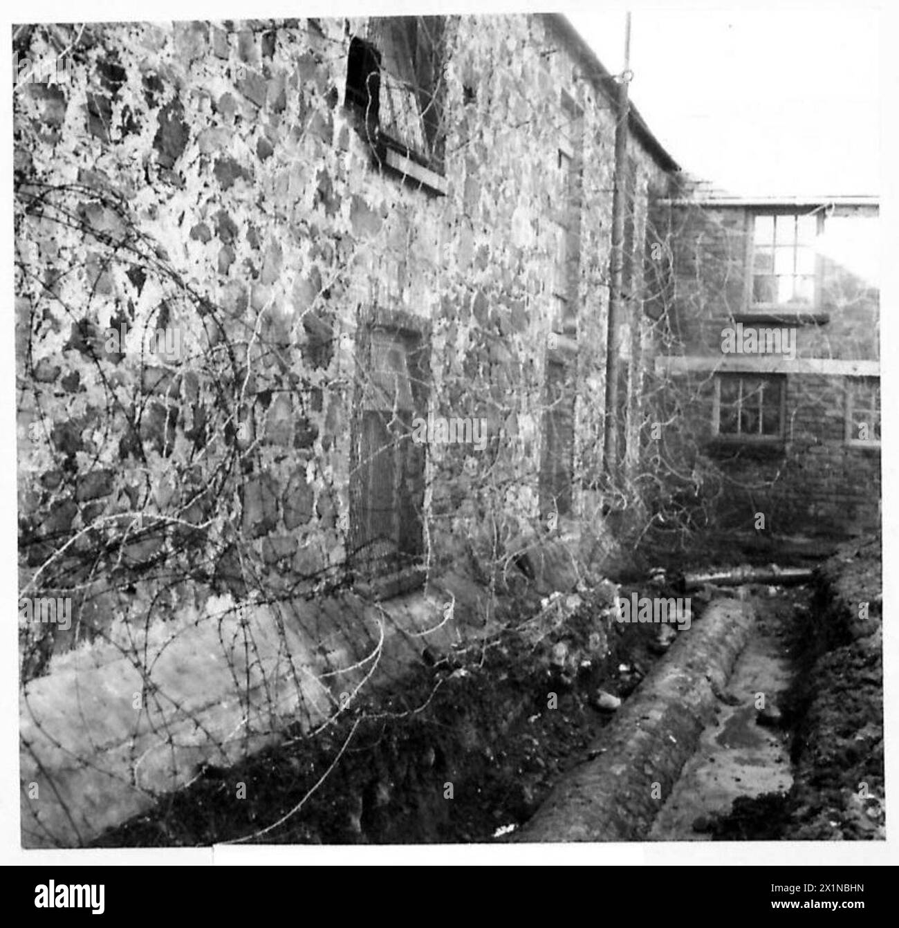 L'extérieur de la caserne de détention militaire à Carrickfergus montre que des mesures de sécurité ont été mises en œuvre en raison de la faiblesse des travaux de construction et du mauvais état des salles 1 et 3 de l'Association. Banque D'Images