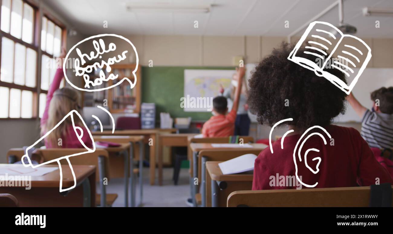 À l'école, un groupe diversifié d'élèves et leur professeur se concentrent sur une leçon Banque D'Images