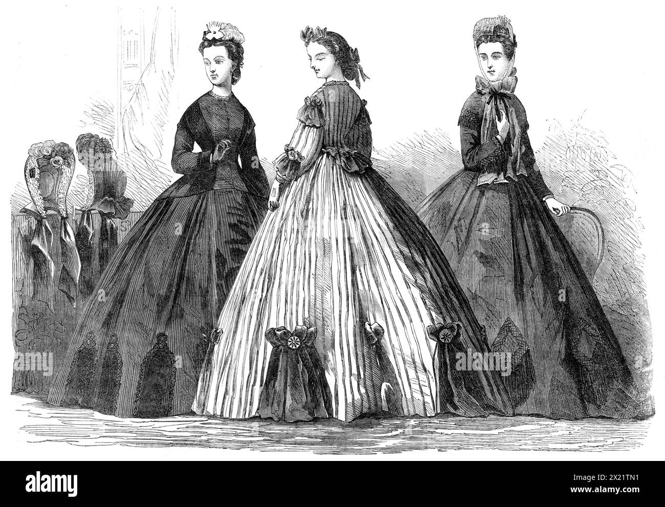 Paris mode pour avril 1864. 'Fig. 1. Robe de soirée. Robe antique moiré bleu foncé, garnie de velours... chaque ornement de velours sur la jupe est bordé de dentelle noire. Le corsage &#xe0 ; basque, s'ouvrant derrière, composé de moiré et velours, et garniture velours est également appliqué sur les manches. La tête-robe est composée d'une plume blanche, d'un papillon jaune, et d'une aigrette, col en dentelle très étroite. Fig. 2. Toilettes pour une jeune dame. Robe de taffetas couleur pierre, avec des rayures violettes, ornée autour de la jupe de portions de volants tressés, attachés par un noeud en passementerie. Corsage pos Banque D'Images