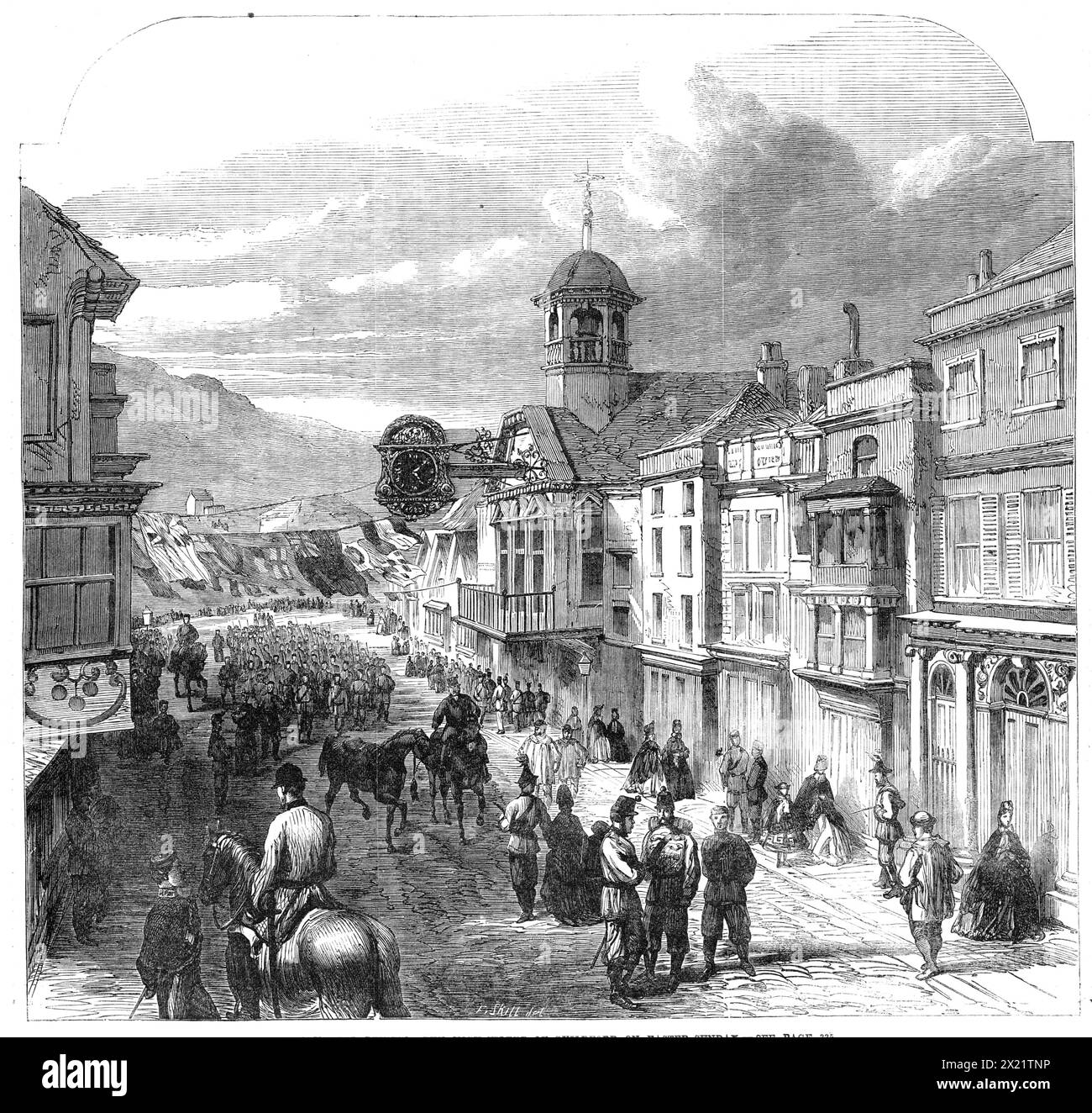 The Volunteer Review : The High-Street of Guildford le dimanche de Pâques, 1864. La ville se compose principalement de cette rue principale, qui monte la colline escarpée sur la rive est de la rivière Wey. Il y a peu de meilleurs spécimens d'une vieille ville de campagne anglaise que cette petite capitale confortable du Surrey rustique... le Guildhall, construit à l'époque de Charles Ier..., se distingue à l'extérieur par son cadran d'horloge en saillie, avec des nœuds et des décorations de ferronnerie dorée. Telle est la ville de Guildford, qui du vendredi Saint au lundi de Pâques cette année a été afflué de visiteurs de vacances bien au-delà de sa capacité o Banque D'Images