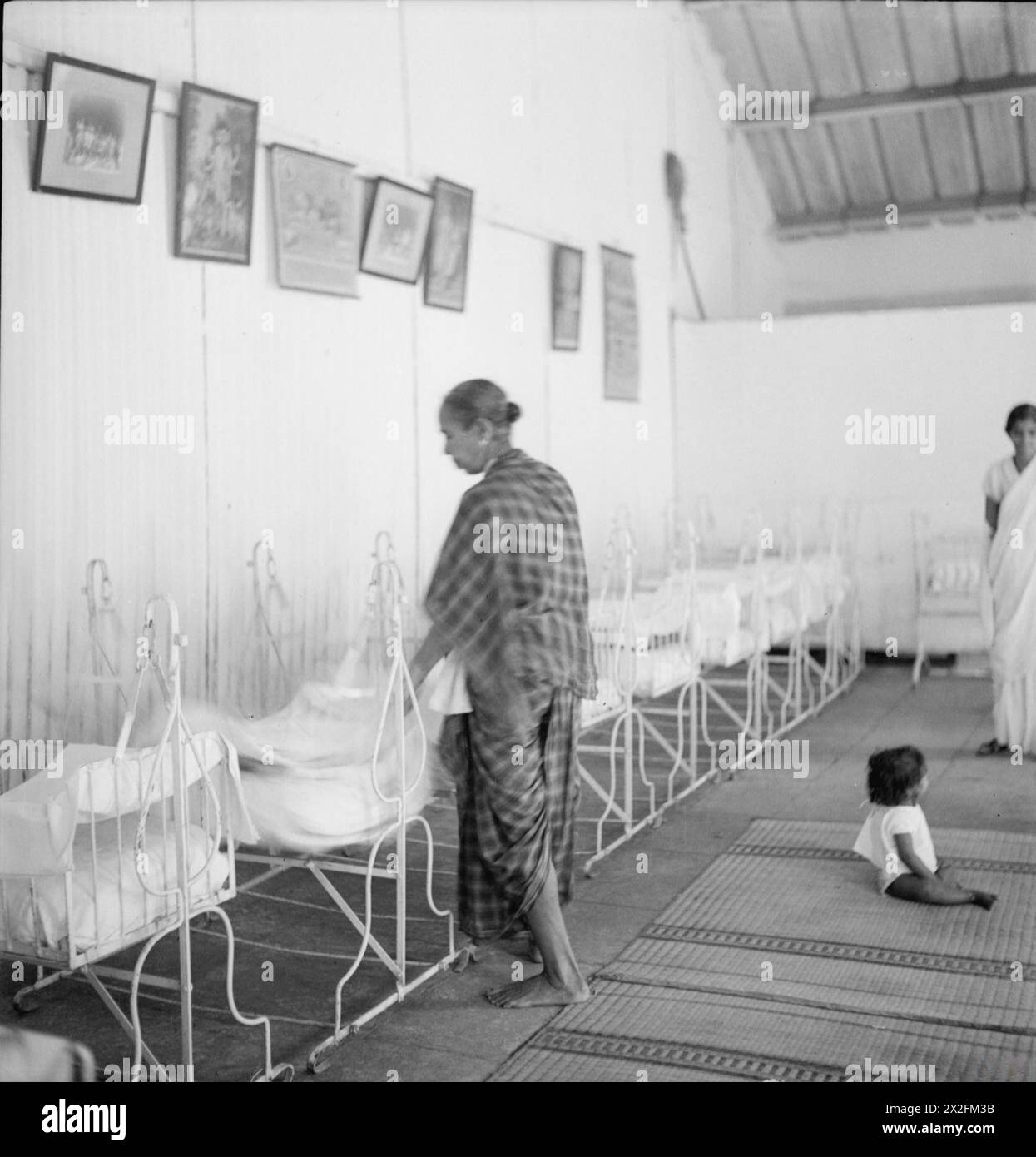 Cecil Beaton capture des images de la vie quotidienne, de l'architecture et des événements sociaux en Inde, en Birmanie et en Chine de décembre 1943 à août 1944. Banque D'Images