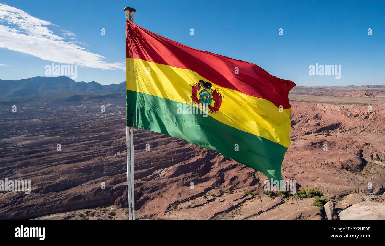 Die Fahne von Bolivien flattert im Wind, isoliert gegen blauer Himmel Banque D'Images