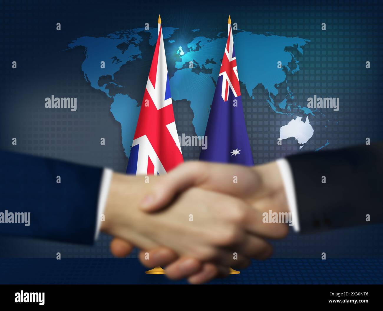 Deux personnes se serrant la main devant les drapeaux australien et britannique Banque D'Images