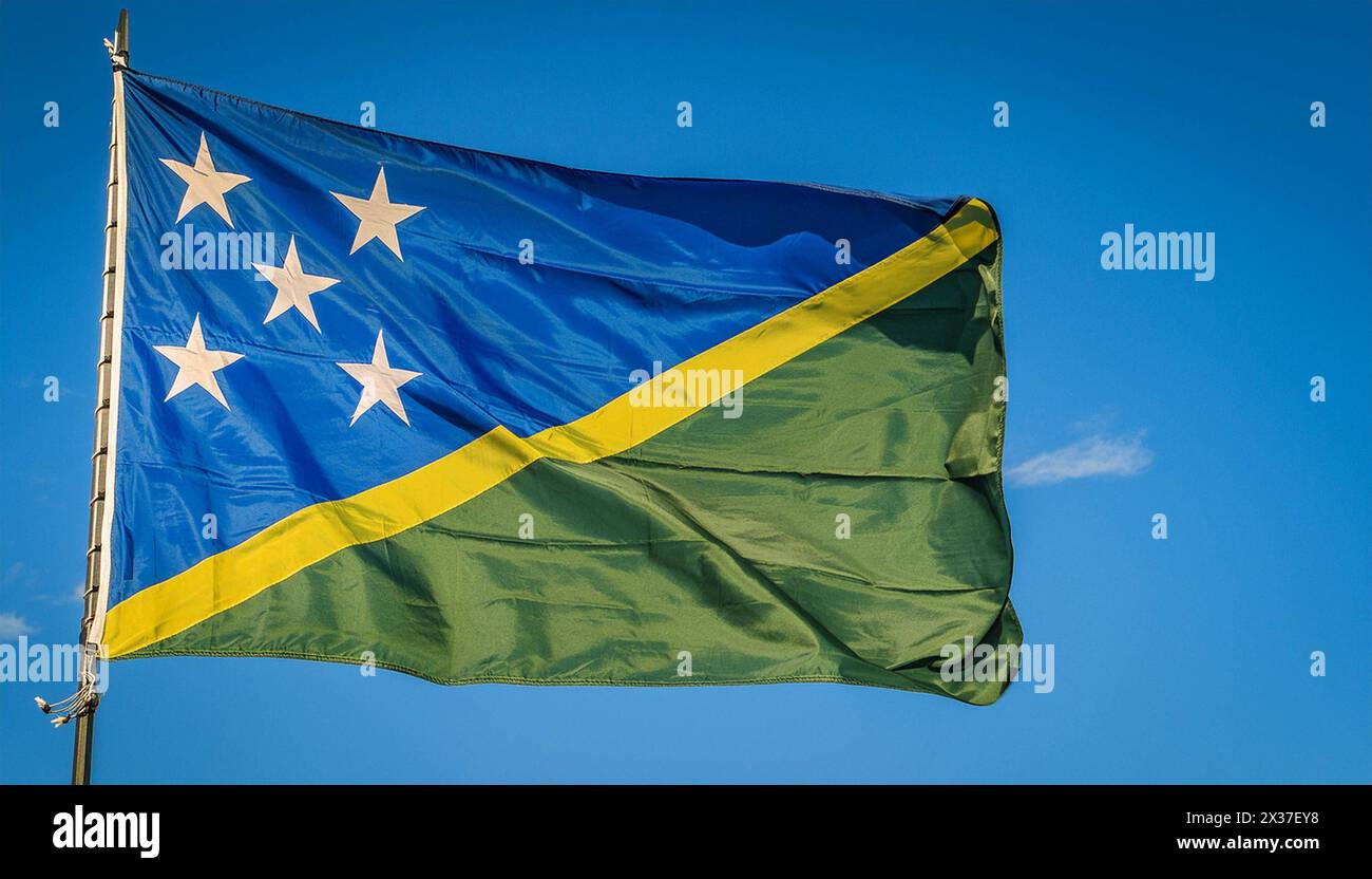 Die Fahne von Salomoninseln, Salomonen, Inselstaat in der Südsee, flattert im Wind, isoliert gegen blauer Himmel Banque D'Images