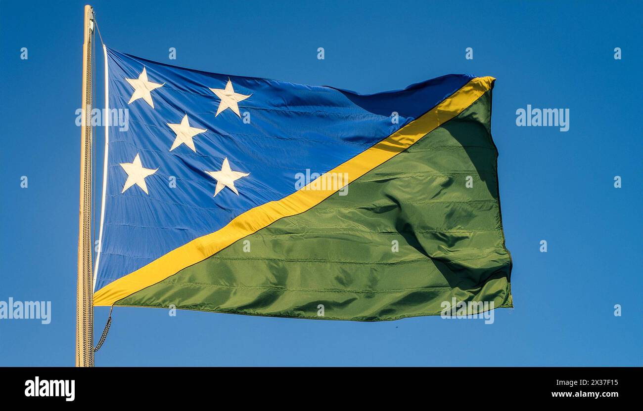 Die Fahne von Salomoninseln, Salomonen, Inselstaat in der Südsee, flattert im Wind, isoliert gegen blauer Himmel Banque D'Images
