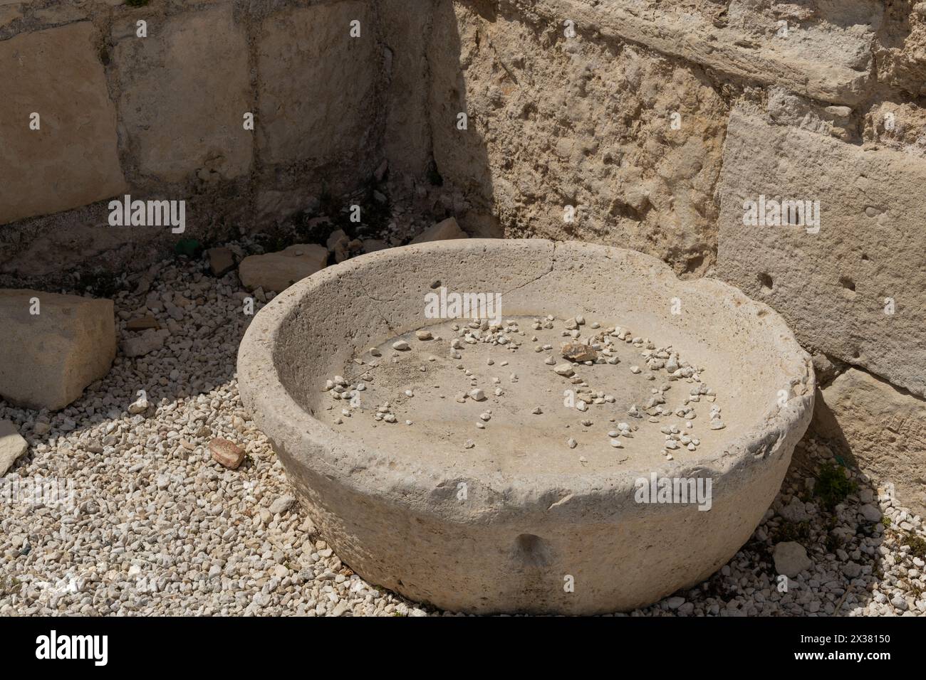 Ancienne pierre de meulage de Kourion. Banque D'Images