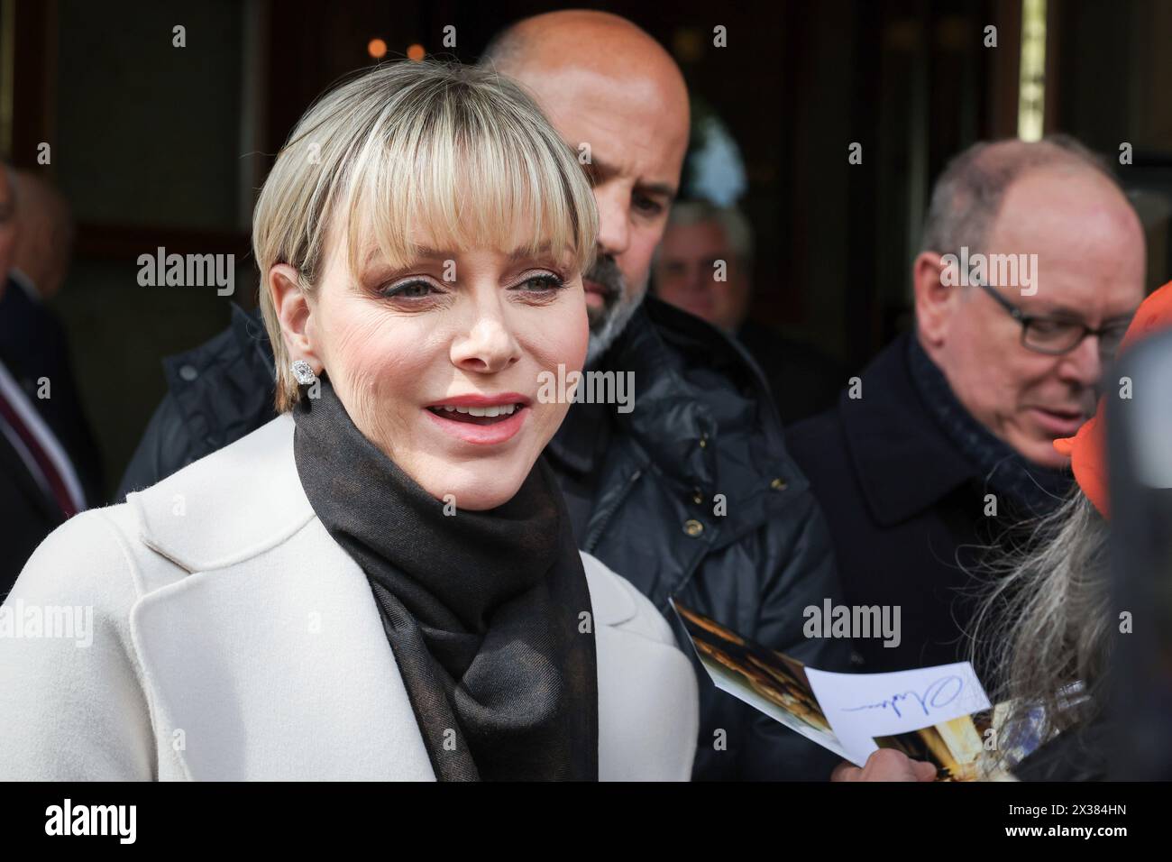 Charlene, left, Princess of Monaco, and Albert II. Prince of Monaco, right, arrive in Hamburg, Germany, Thursday, April 25, 2024. The couple attends the opening of the new 'Monaco World' of the Miniatur Wonderland in Hamburg. (Christian Charisius/dpa via AP) Banque D'Images