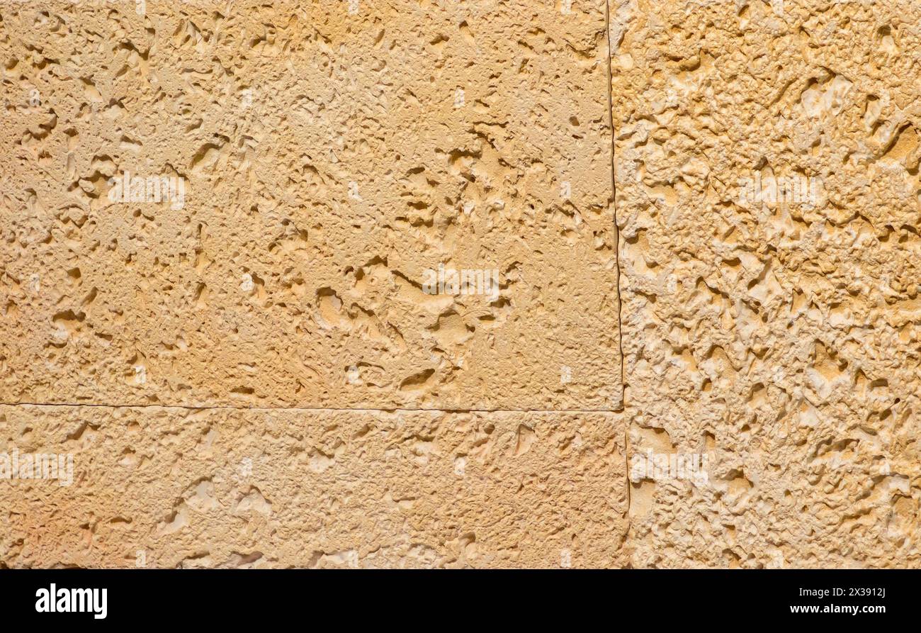 Fond de motif de texture rugueuse de matériau de pierre beige Banque D'Images