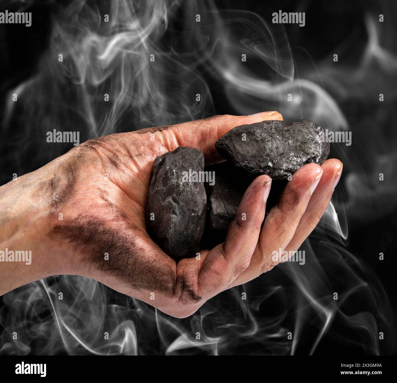 Manipulation du charbon. Banque D'Images