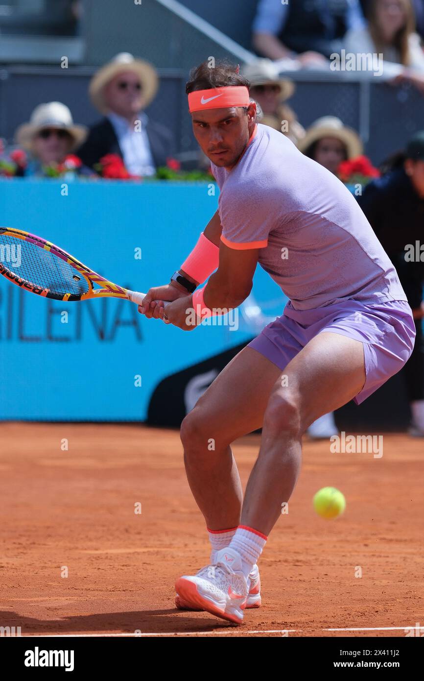 Rafael Nadal, d’Espagne, contre Cachin a dans leur manche de 32 au septième jour de l’Open Mutua de Madrid à la Caja Magica le 29 avril 2024 à MAD Banque D'Images