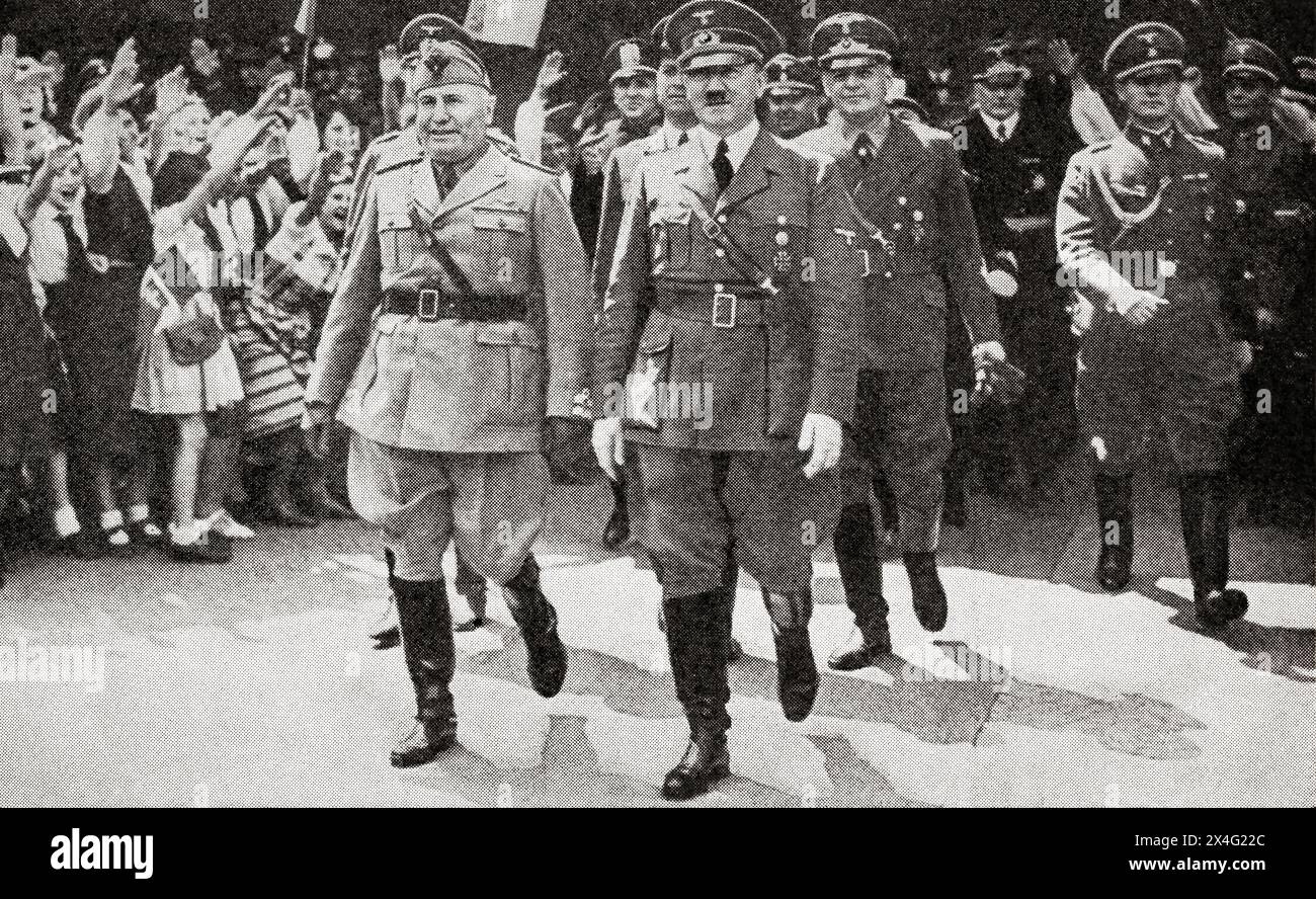 EDITORIAL la réunion d'Hitler et Mussolini à Munich, le 18 juin 1940. Adolf Hitler, 1889 – 1945. Homme politique allemand, démagogue, révolutionnaire panallemand, chef du parti nazi, chancelier d'Allemagne et Führer de l'Allemagne nazie de 1934 à 1945. Benito Amilcare Andrea Mussolini, 1883 – 1945. Dictateur italien, journaliste, fondateur et dirigeant du Parti national fasciste (PNF), et premier ministre italien. De la Guerre en images, première année. Banque D'Images