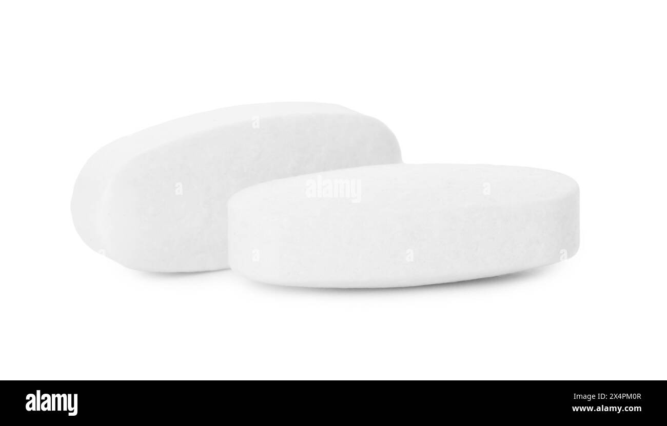 Pilules vitaminiques isolées sur blanc. Supplément de santé Banque D'Images