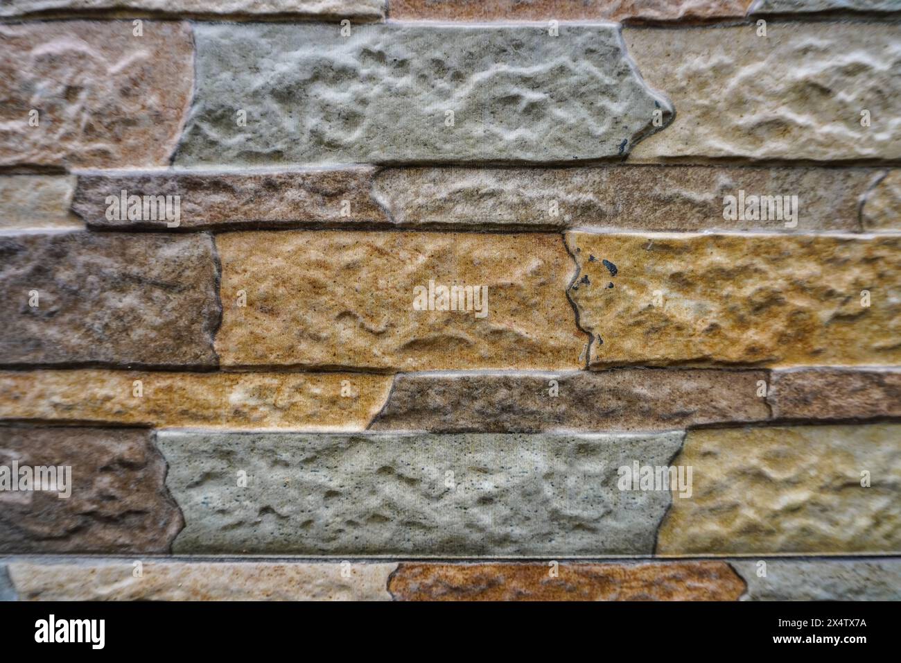 Fond de mur en pierre naturelle soigneusement arrangé Banque D'Images
