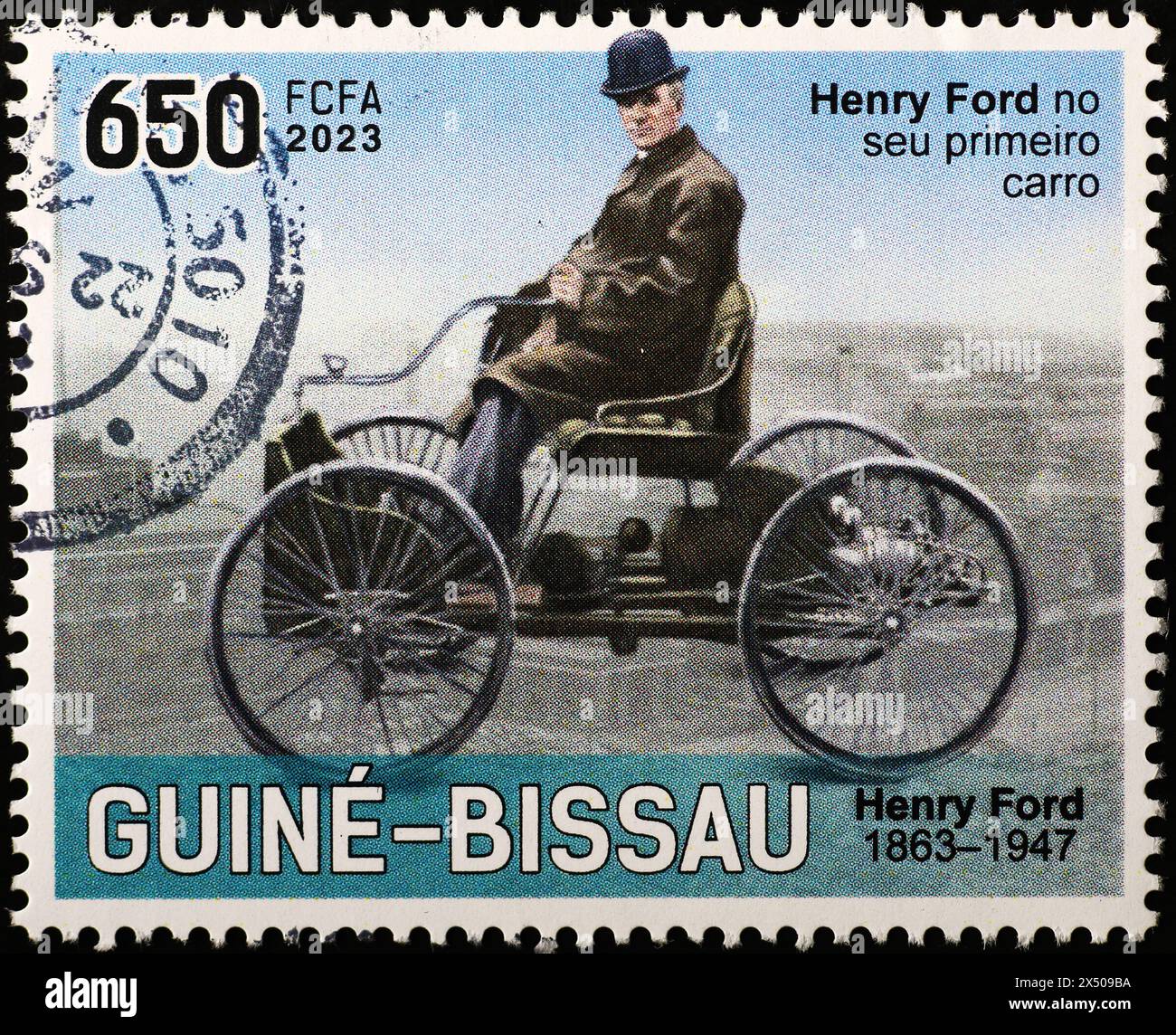 Henry Ford assis sur sa première voiture sur timbre-poste Banque D'Images