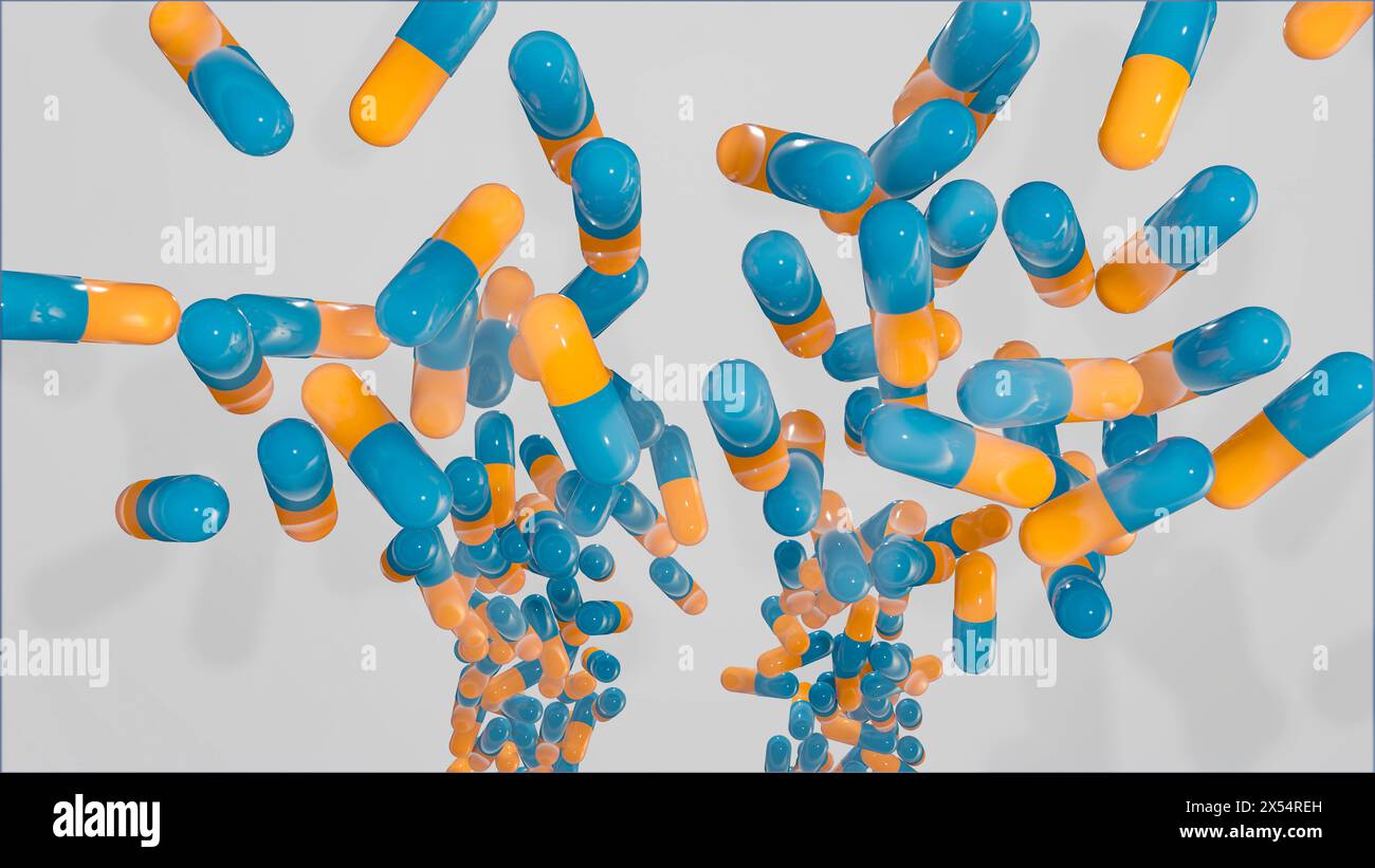 Capsules médicales bleu orange, pilules tombant dans une boîte. Capsules médicales bleu orange, pilules tombant dans une boîte. Production industrielle de médecine, ANT Banque D'Images