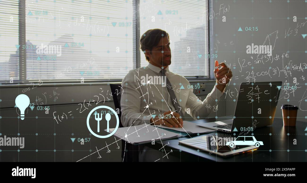 Image de plusieurs icônes, équation mathématique et diagrammes, homme caucasien travaillant sur ordinateur portable Banque D'Images