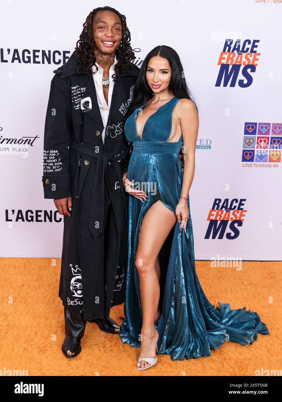 Century City, États-Unis. 10 mai 2024. CENTURY CITY, LOS ANGELES, CALIFORNIE, États-Unis - 10 MAI : Tyla Yaweh et sa petite amie Natasha Graziano arrivent au 31e gala annuel Race to Erase MS 2024 qui se tient au Fairmont Century Plaza le 10 mai 2024 à Century City, Los Angeles, Californie, États-Unis. (Photo de Xavier Collin/image Press Agency) crédit : image Press Agency/Alamy Live News Banque D'Images