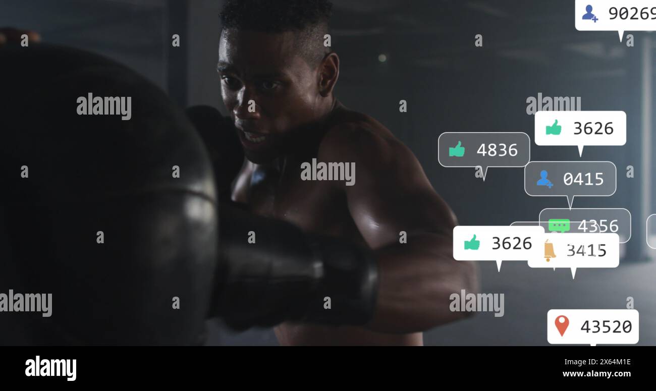Image d'icônes de médias sociaux sur un boxeur afro-américain pratiquant des coups de poing au gymnase Banque D'Images