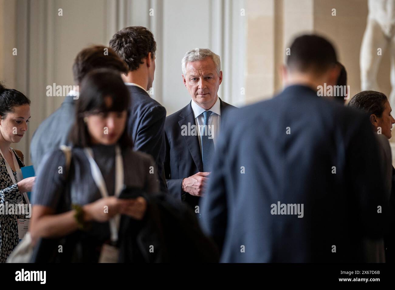 Versailles, France. 13 mai 2024. Bruno le Maire, ministre français de l'économie, et Arthur Mensch, fondateur de la startup Mistral ai, participent au septième Sommet « Choose France », visant à attirer les investisseurs étrangers dans le pays, au Château de Versailles, à l'extérieur de Paris, le 13 mai 2024. Photo par Eliot Blondet/ABACAPRESS. COM Credit : Abaca Press/Alamy Live News Banque D'Images