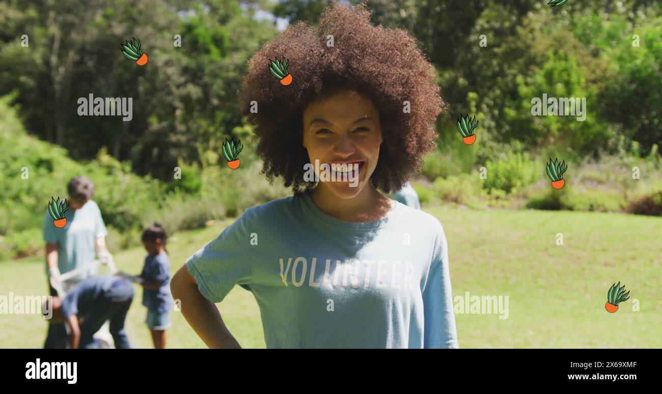 Image de feuilles d'automne tombant sur la famille caucasienne heureuse dans le parc Banque D'Images