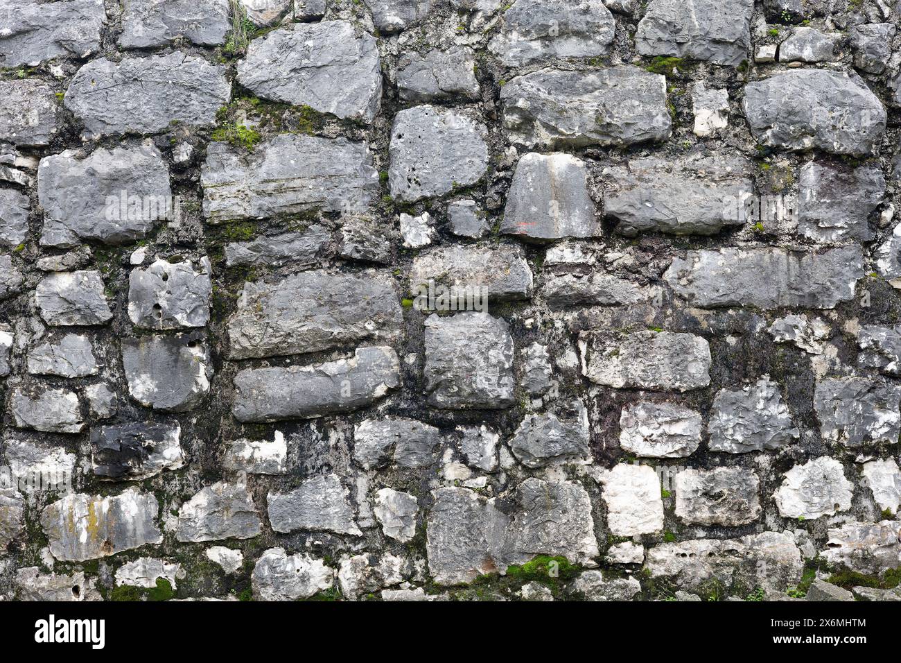 Vieux fond de texture de mur en pierre avec de la mousse, Turquie Banque D'Images
