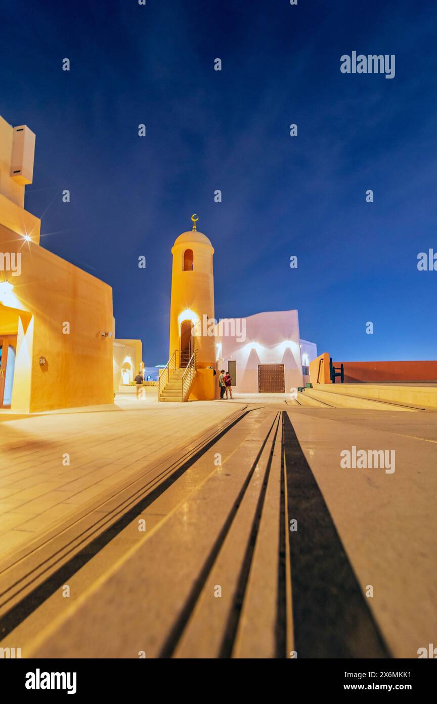 Prises de vue en soirée dans le quartier de Myna du vieux port de Doha capitale du Qatar, le golfe Persique Banque D'Images