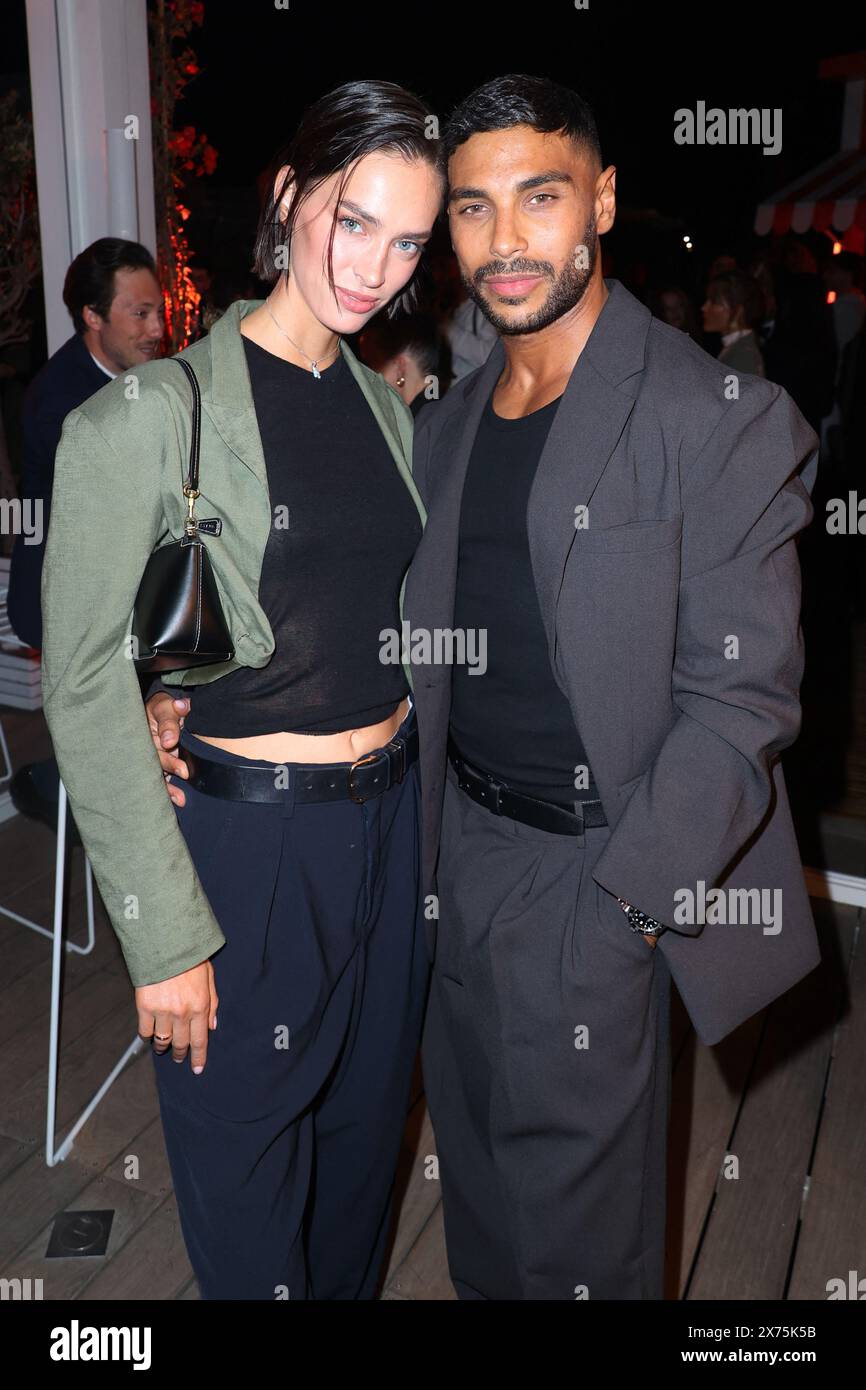 Kristel Van de Kamp et Nassim Lyes présents à la Nespresso x Vanity Fair x Instagram Party à la plage Nespresso lors du 77e Festival de Cannes le 17 mai 2024 à Cannes. Photo de Jerome Dominé/ABACAPRESS. COM Credit : Abaca Press/Alamy Live News Banque D'Images