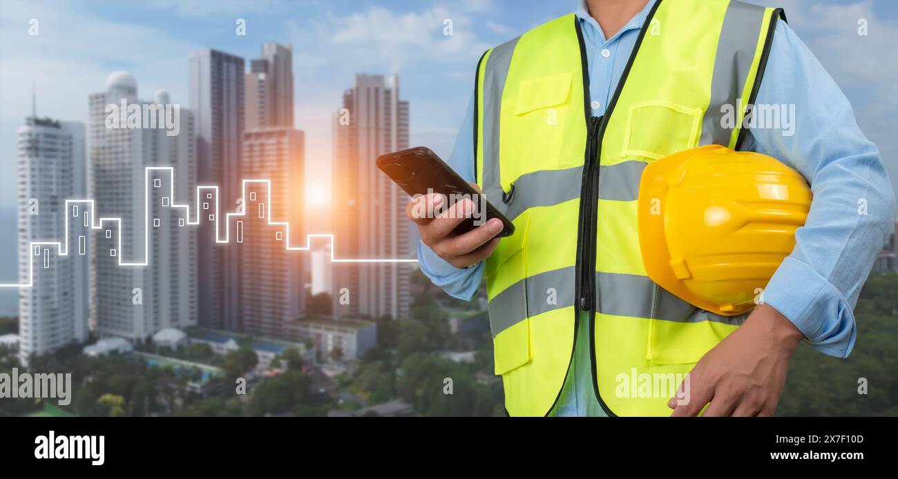 Ingénieur civil architecte à l'aide d'un smartphone pour communiquer et donner des ordres à l'équipe de construction, Engineer Building concept, fond pour constru Banque D'Images