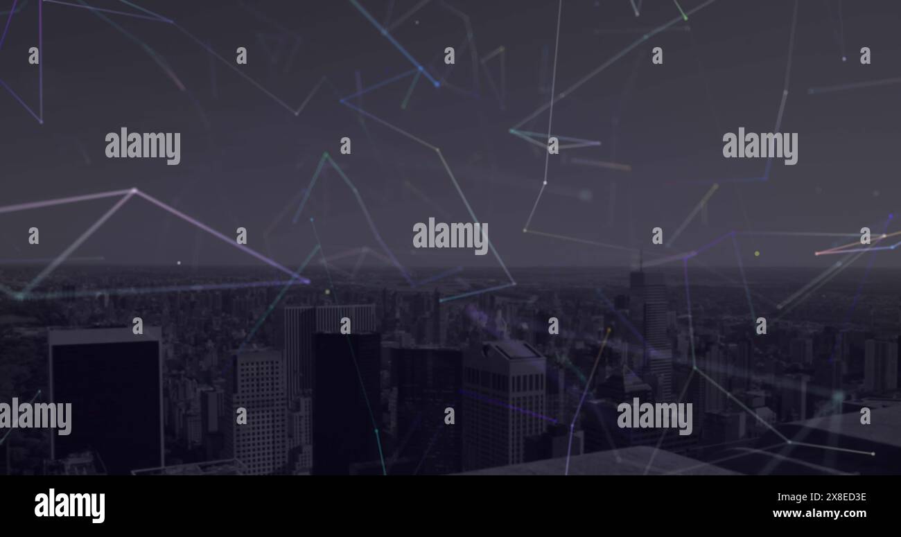 Un paysage urbain au crépuscule, éclatant avec des lignes et des nœuds numériques Banque D'Images