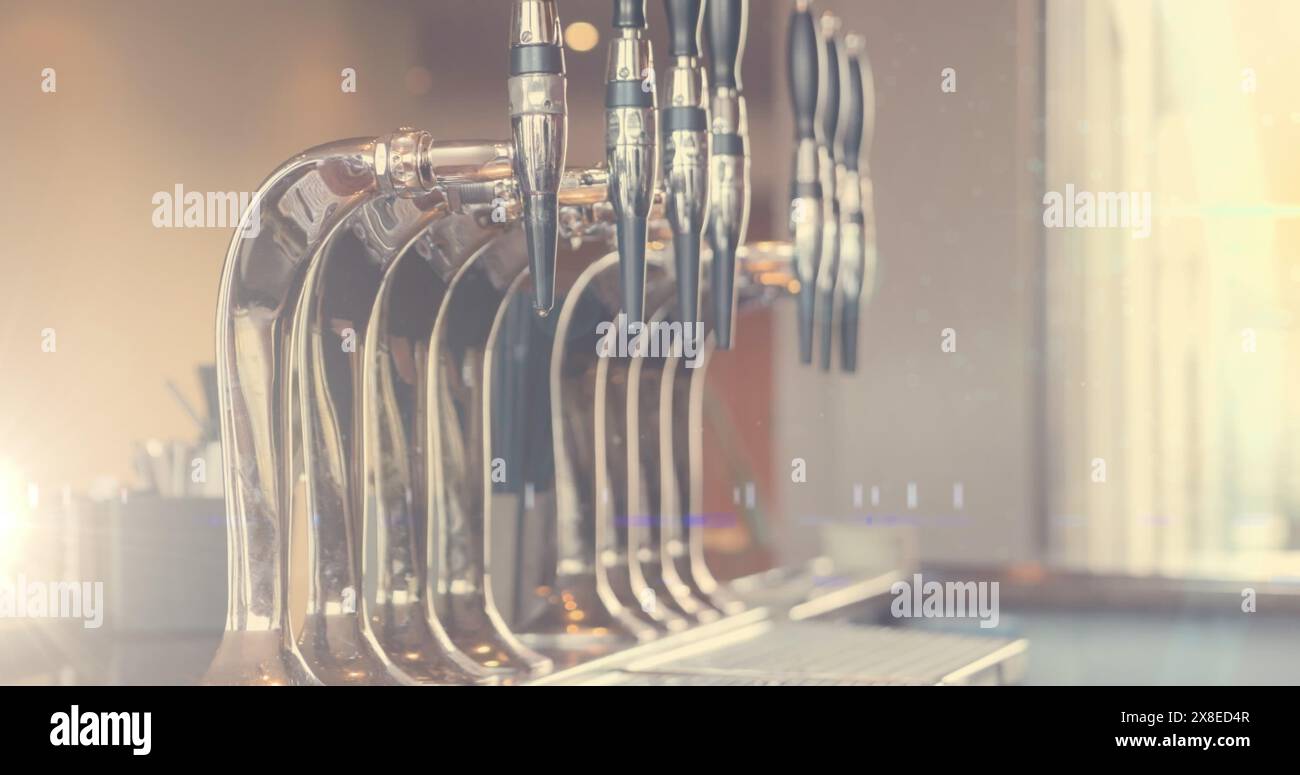 Lumière du soleil mettant en valeur les robinets de bière au bar, mettant en valeur leur design élégant Banque D'Images