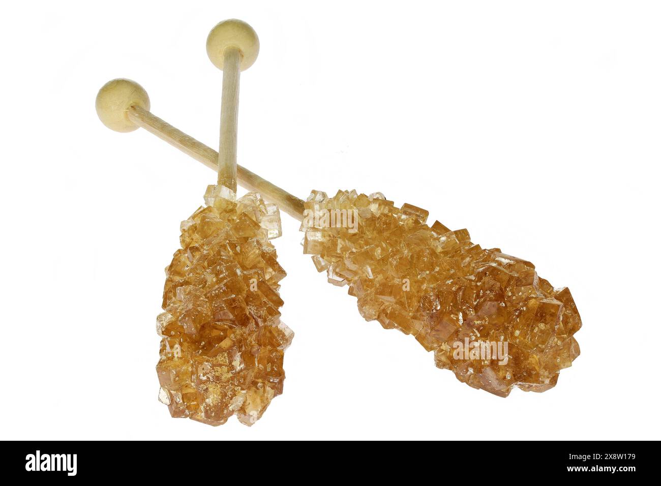 bâtonnets de bonbons de roche bruns isolés sur fond blanc Banque D'Images