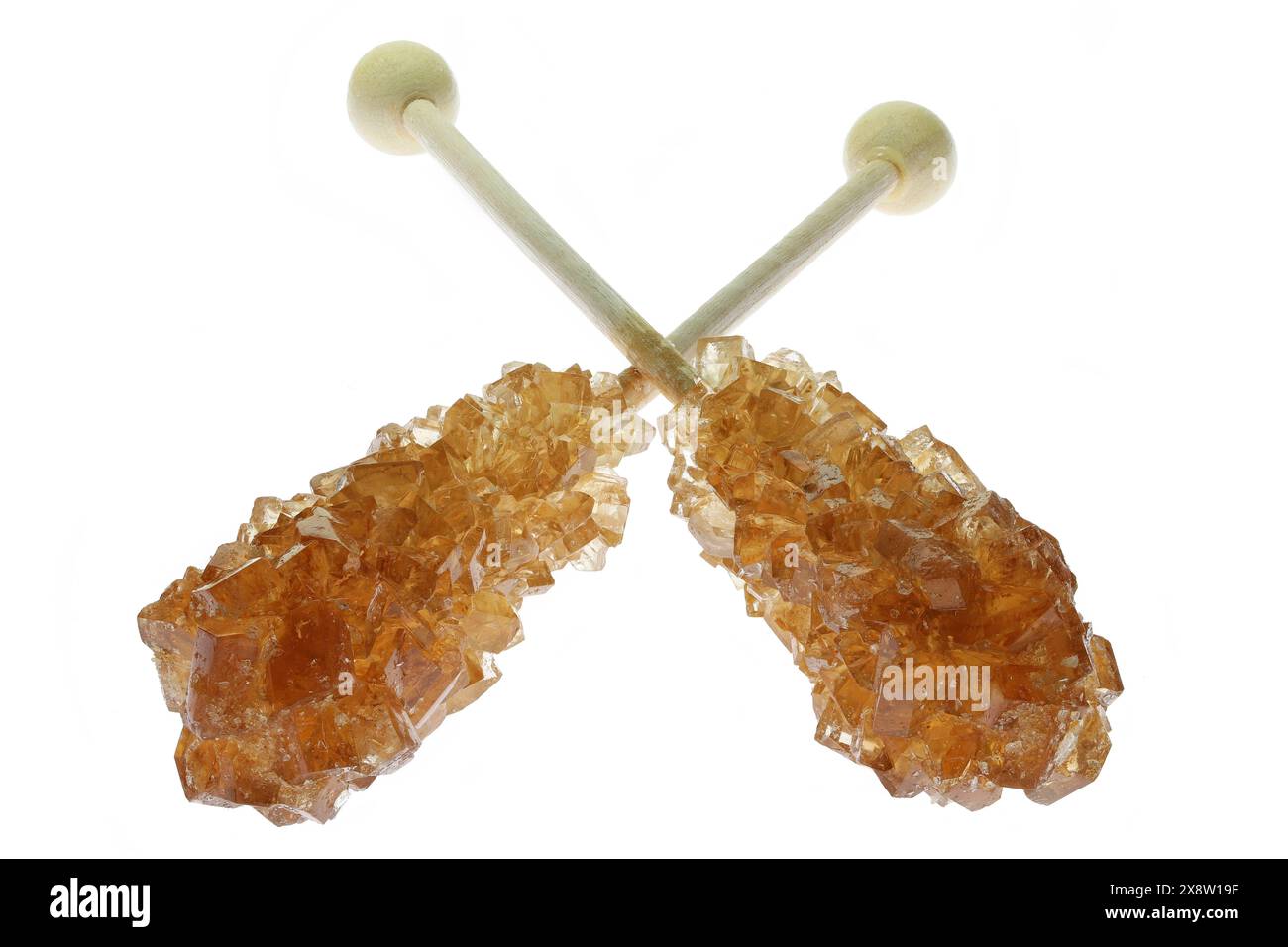bâtonnets de bonbons de roche bruns isolés sur fond blanc Banque D'Images