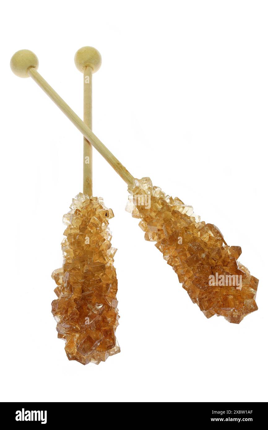 bâtonnets de bonbons de roche bruns isolés sur fond blanc Banque D'Images