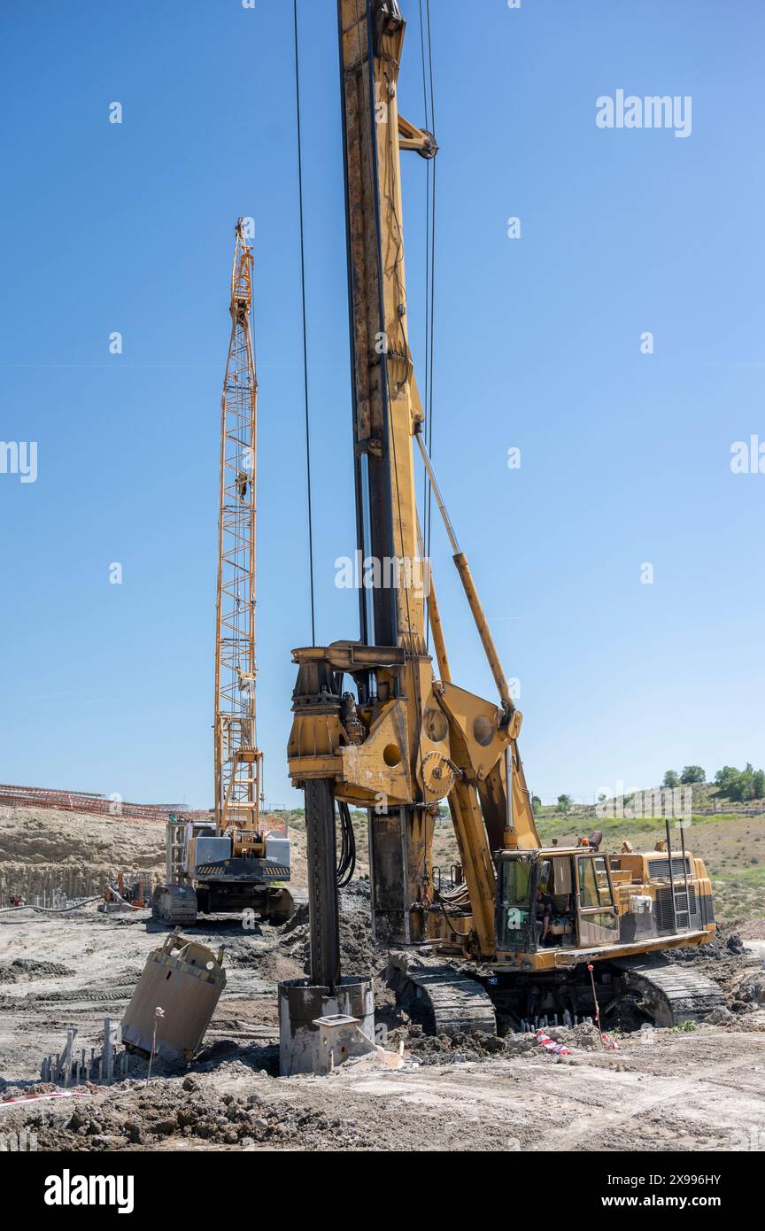 Earth Mover's Ballet : la chorégraphie précise de l'excavation de tranchées Banque D'Images