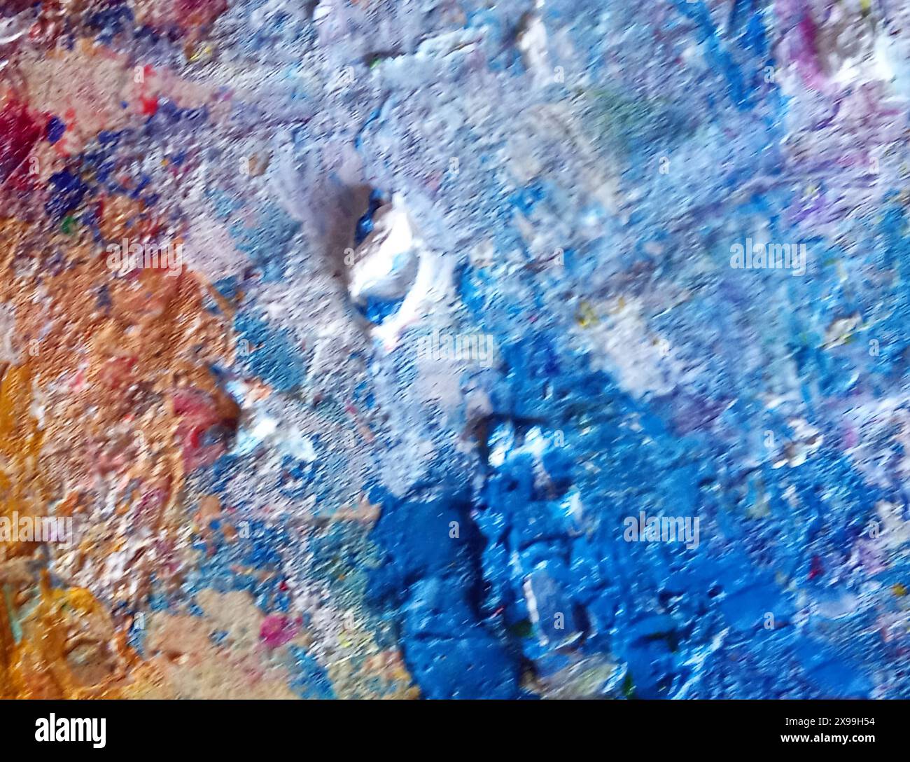 Peintures à l'huile mélangées ensemble sur une palette pour le fond Banque D'Images