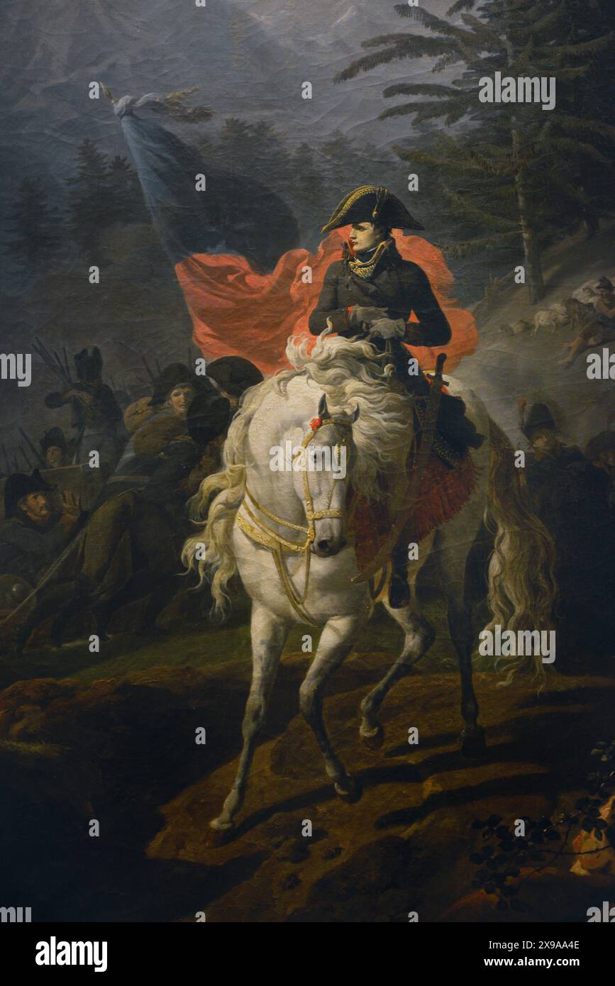 Napoléon Bonaparte (1769-1821) Chef militaire et politique français. Comme Napoléon Ier, il fut empereur de France (1804-1815). Napoléon traverse le col du Saint Bernard. Napoléon est représenté conduisant le transport héroïque de l'artillerie le long des sentiers alpins enneigés du col du Grand Saint-Bernard, dans des conditions très difficiles pour les soldats, qui ont dû traîner les canons lourds épuisés et très froids. L'armée de Bonaparte traverse les Alpes par surprise en 1800, se dirigeant vers l'Italie pour affronter les Autrichiens. Huile sur toile de Nicolas-Antoine Taunay (1755-1830), 1801. Détail. Musée du Risorgimento. Milan, Italie. Banque D'Images