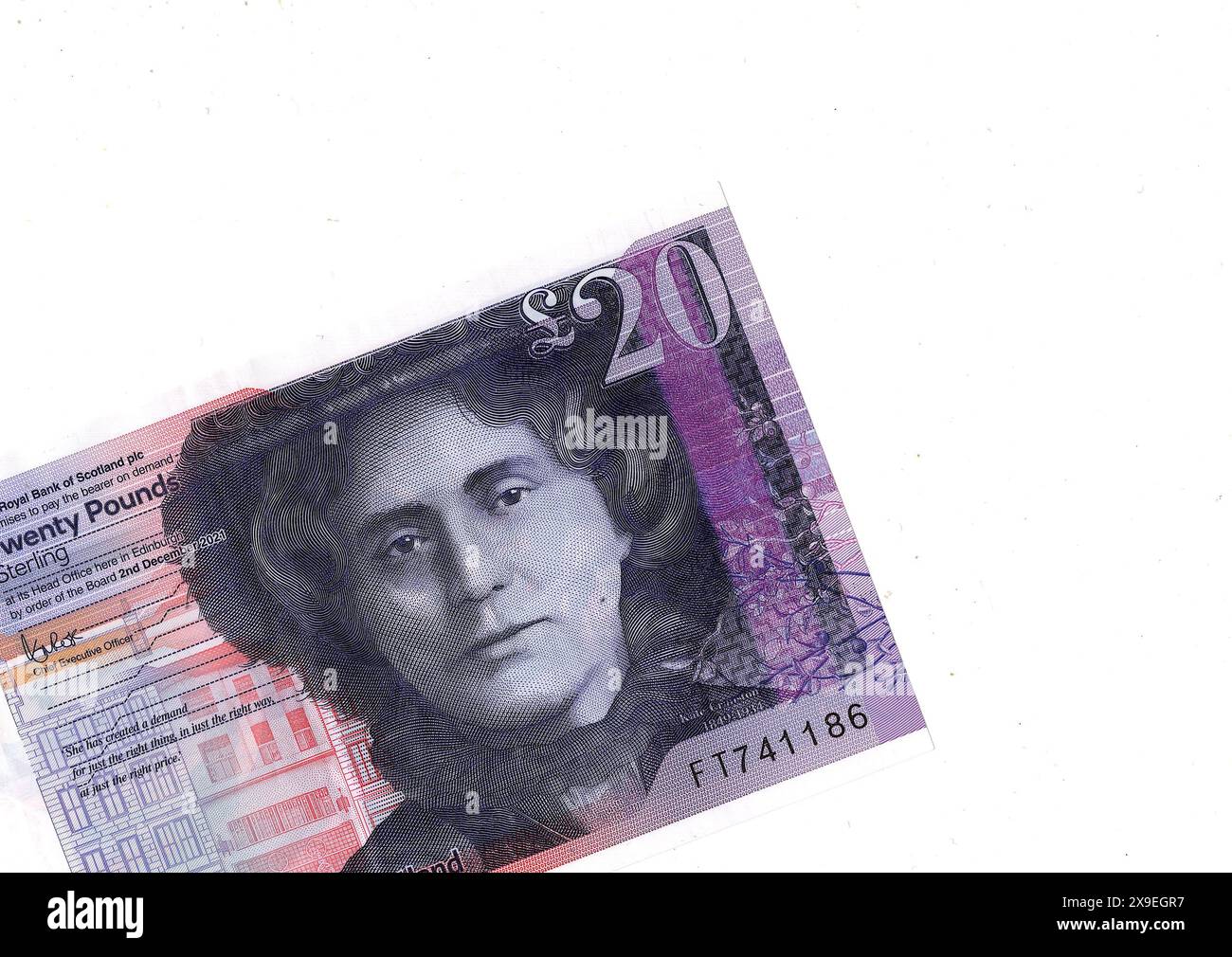 Gros plan d'un billet de banque écossais moderne de vingt livres en polymère sur un fond blanc. Banque D'Images