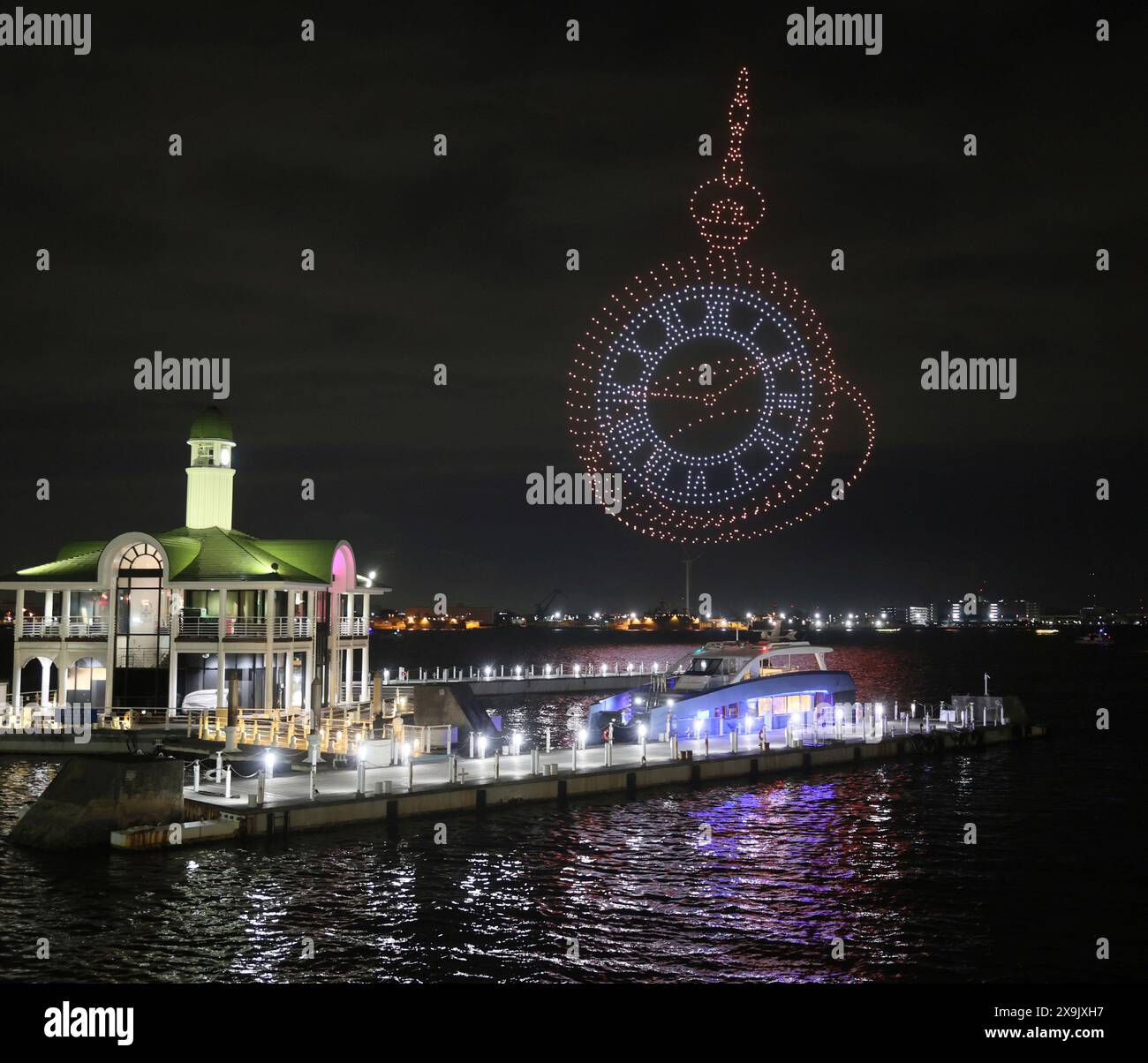 A drone show is performed during the Yokohama Port Festival at Rinko Park in Yokohama, Kanagawa Prefecture on June 1st,2024. The Port of Yokohama formally opened to foreign trade on the 2nd of June 1859 and the festival will be held to celebrate the port. ( The Yomiuri Shimbun via AP Images ) Banque D'Images