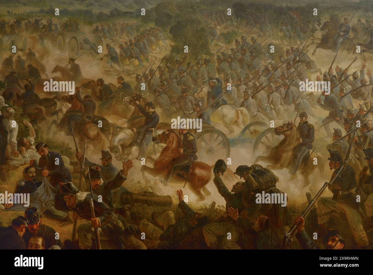 Unification italienne. Seconde Guerre d'indépendance italienne. Bataille de San Martino (24 juin 1859). L'armée autrichienne a été vaincue par les troupes françaises et piémontaises. Il a eu lieu sur les hauteurs de San Martino près de Desenzano del Garda. Dans le tableau, les Brigades d'Aoste et de Pinerolo, dirigées par le général Filiberto Molard, avancent contre les Autrichiens sous un ouragan violent. Au centre, Victor Emmanuel II à cheval, épée tirée. Tableau de Vincenzo Giacomelli (1841-1890), 1861. Huile sur toile. Musée du Risorgimento. Milan. Italie. (En prêt, MIBAC Soprintendenza belle Arti e Paesaggio, Mil Banque D'Images