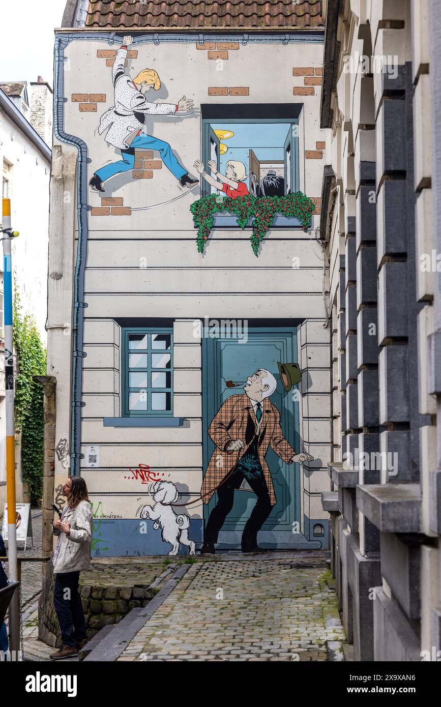 Un dessin animé mural dans une rue de Bruxelles, la capitale belge Banque D'Images