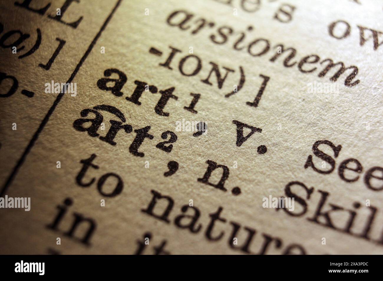 Word art sur la page du dictionnaire, macro gros plan Banque D'Images