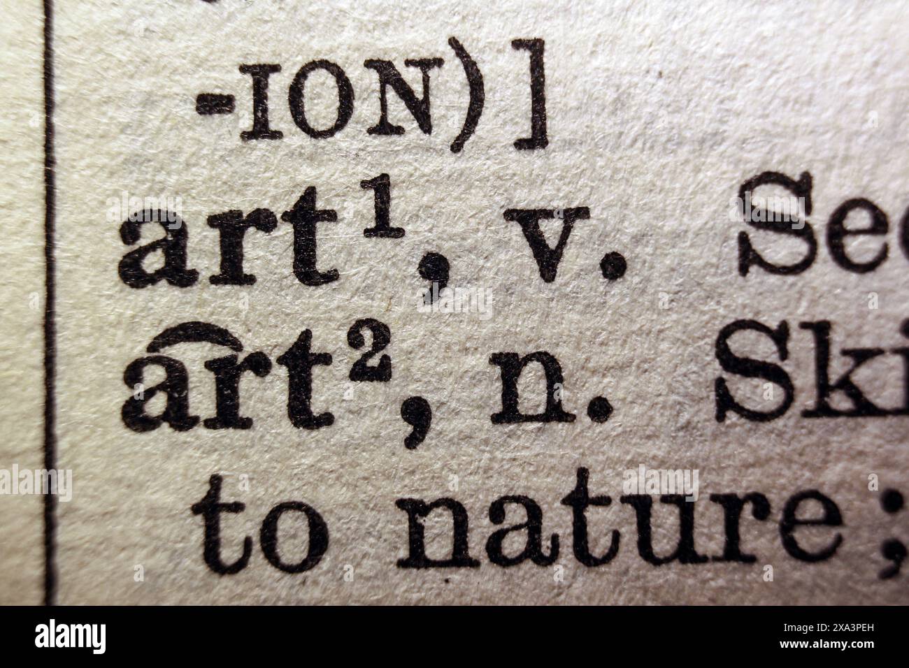 Word art sur la page du dictionnaire, macro gros plan Banque D'Images